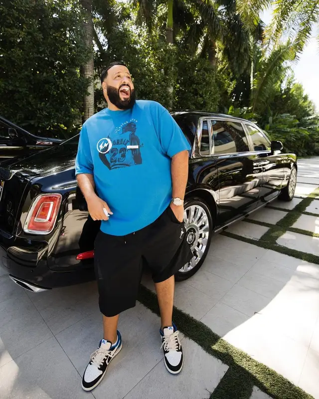 DJ Khaled outfit in Jordan, Travis Scott Merch, and Fragment, 2021