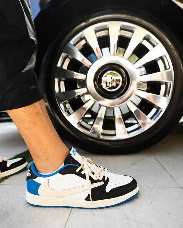 DJ Khaled outfit in Jordan, Travis Scott Merch, and Fragment, 2021