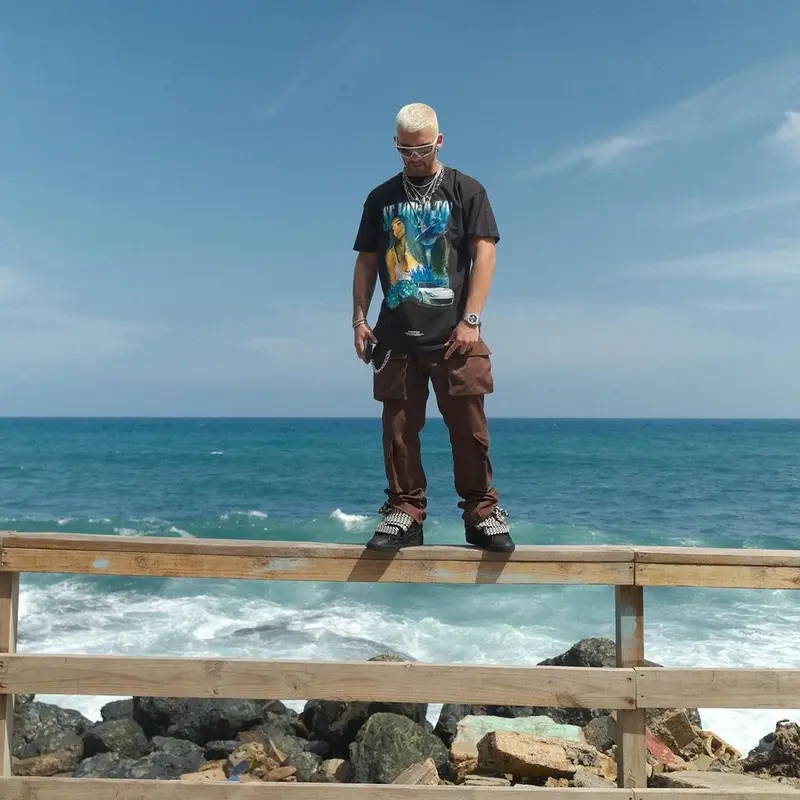 Manuel Turizo outfit in Karol G Merch, Lanvin, and Prada, 2021