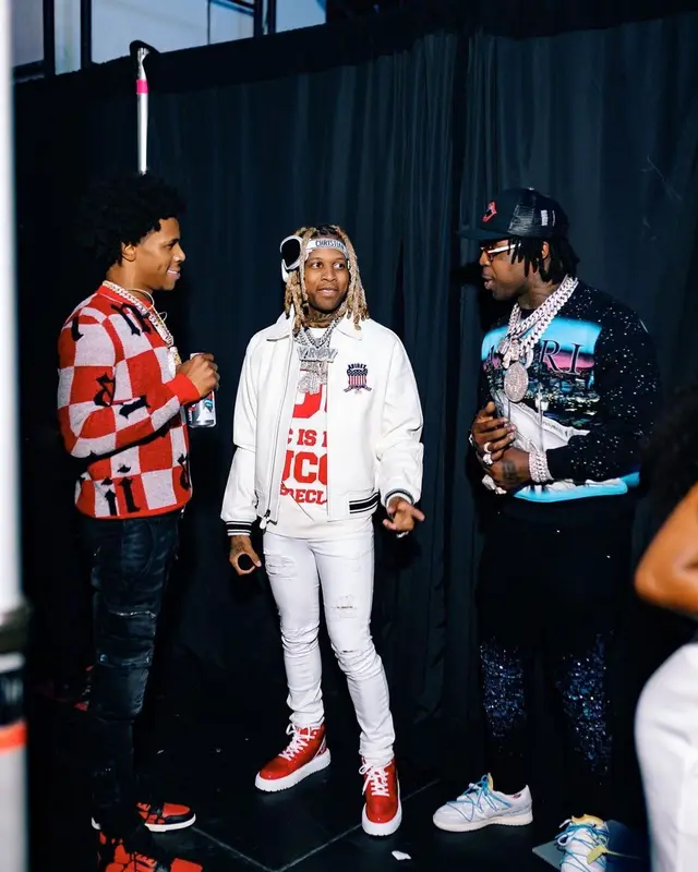 Lil Durk outfit in Avirex, Gucci, and Dior, 2021