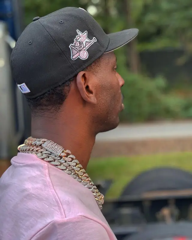 Young Dolph outfit in Supreme, Gallery Dept., and New Era, 2021