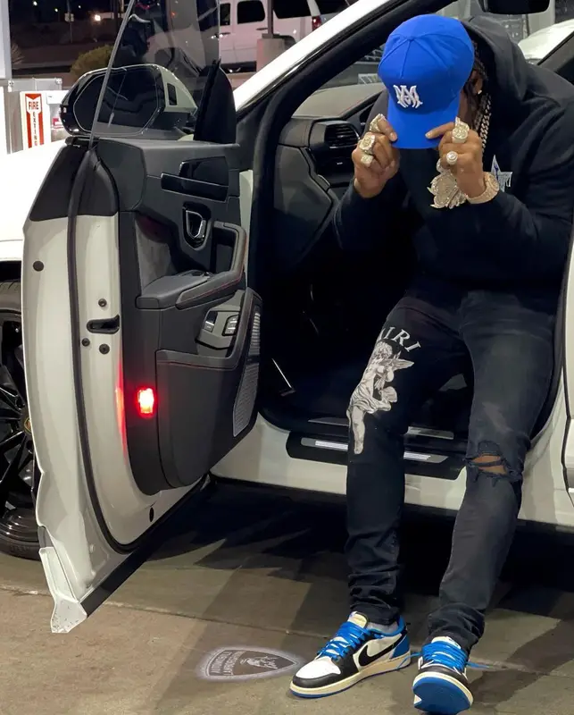 CJ So Cool outfit in Nike, Amiri, and Travis Scott Merch, 2021