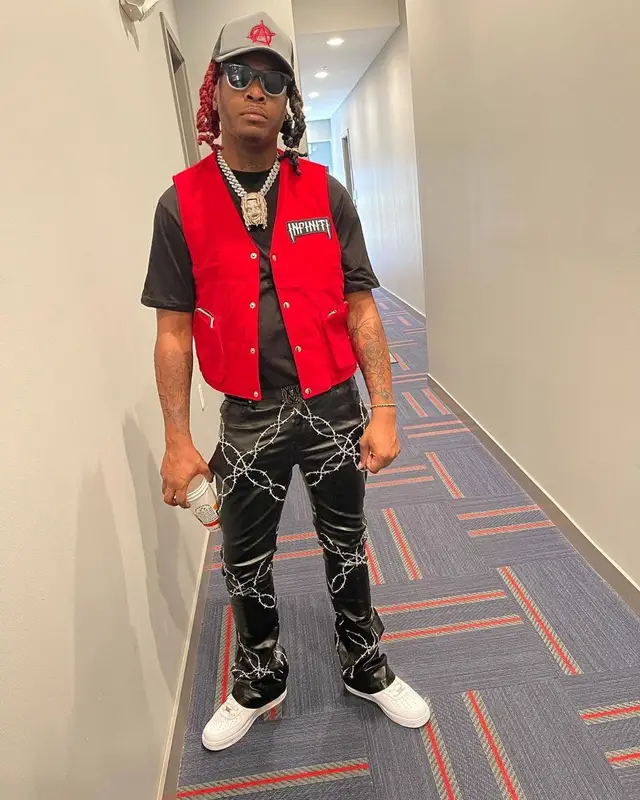 Lil Keed outfit in Infiniti, Nike, and Amiri, 2021