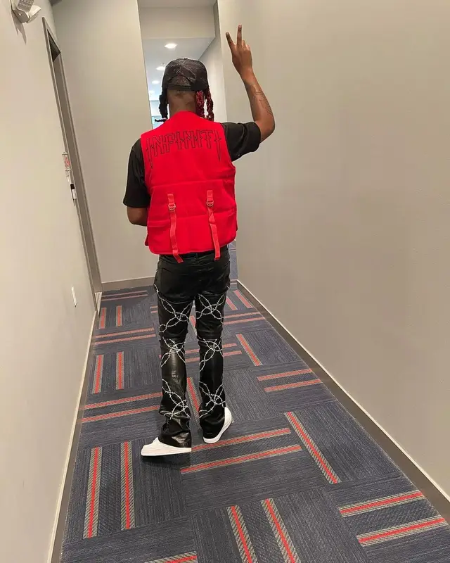 Lil Keed outfit in Infiniti, Nike, and Amiri, 2021
