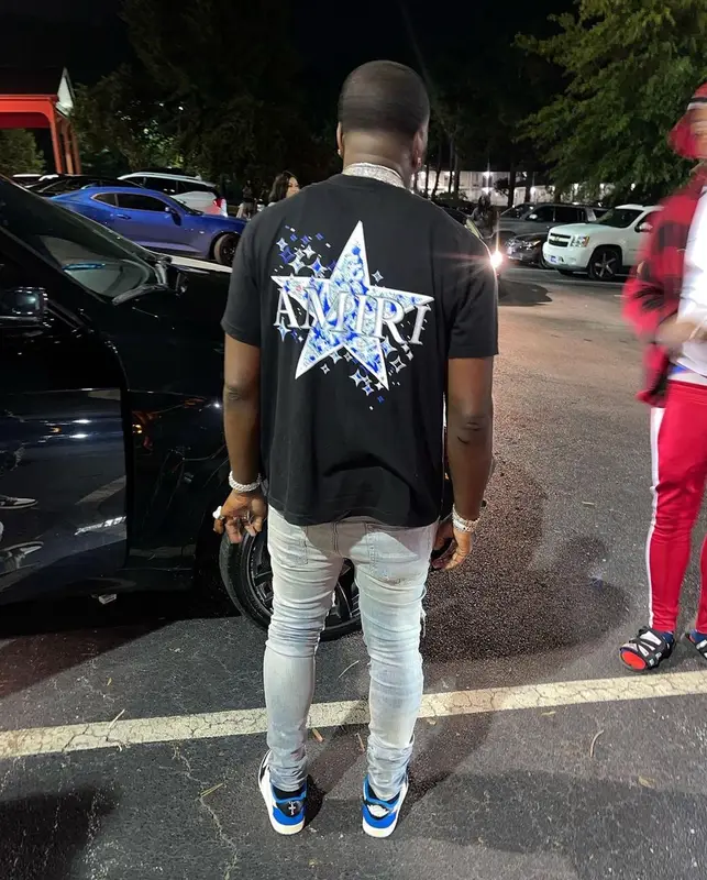 Bankroll Freddie outfit in Amiri, Nike, and Travis Scott Merch, 2021