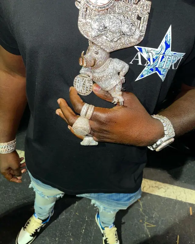 Bankroll Freddie outfit in Amiri, Nike, and Travis Scott Merch, 2021