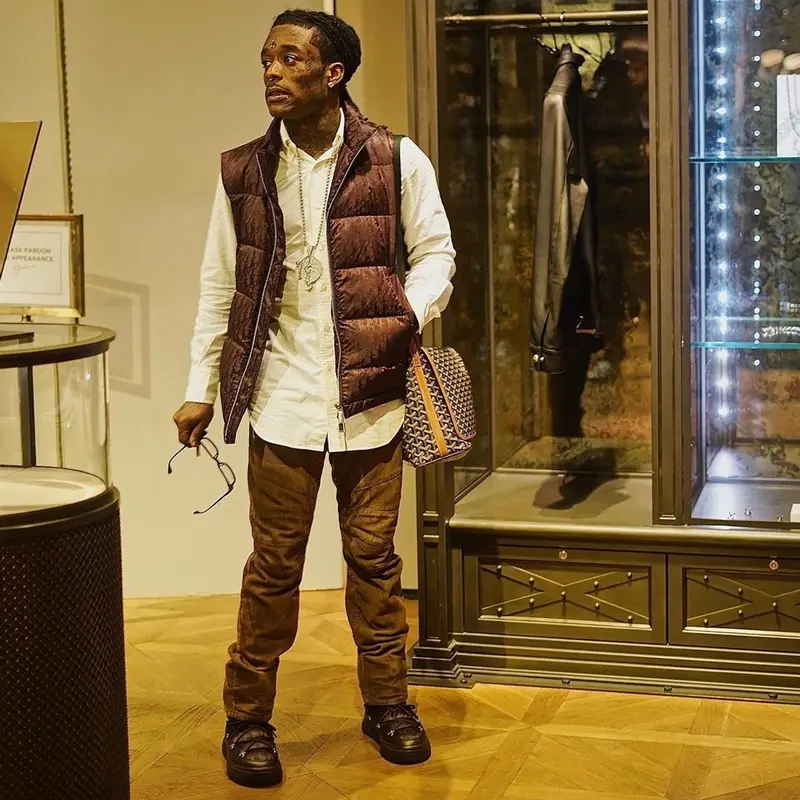 Lil Uzi Vert outfit in Dior, Thom Browne, and Goyard, 2021
