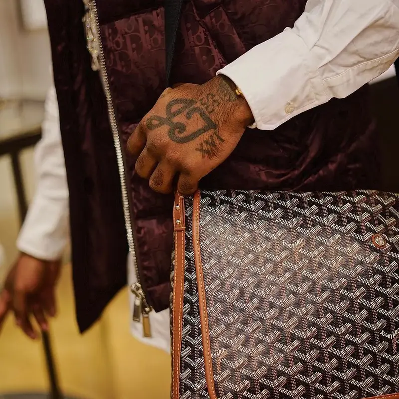 Lil Uzi Vert outfit in Dior, Thom Browne, and Goyard, 2021