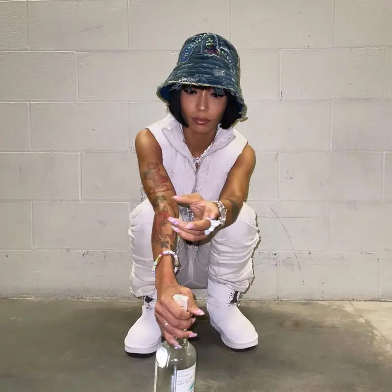 Coi Leray outfit in Valabasas, Evisu, and Who Decides War, 2021