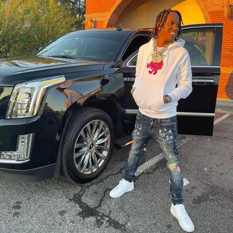 Rich The Kid outfit in Purple Brand, Nike, and Greedy Unit, 2021