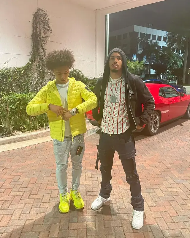 Mikey outfit in Stone Island, Amiri, and MCM, 2021