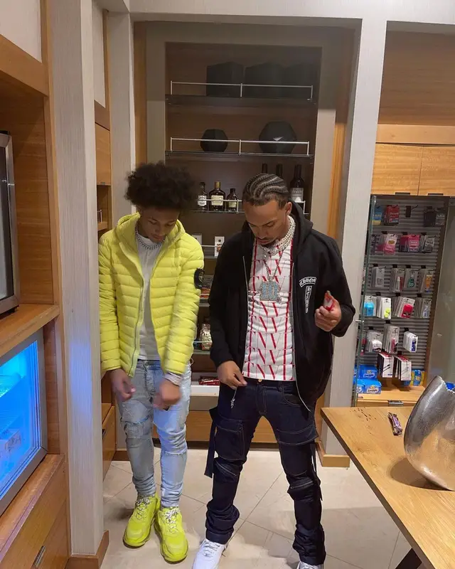 Mikey outfit in Stone Island, Amiri, and MCM, 2021