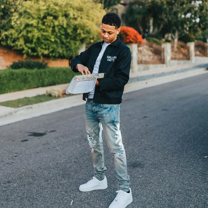 Lil Bibby outfit in Gallery Dept., Polo Ralph Lauren, and Amiri, 2021