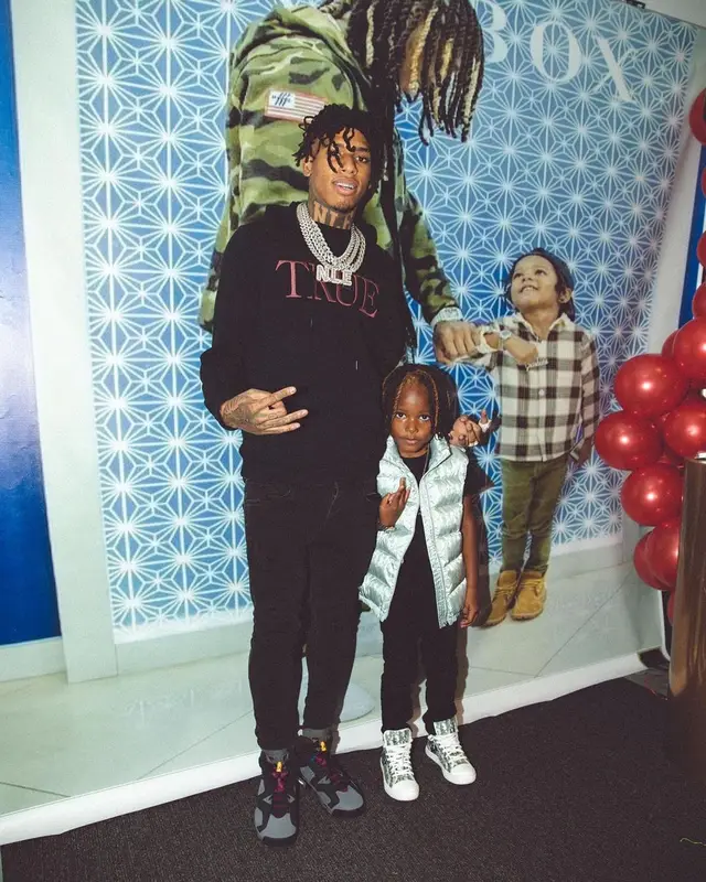 NLE Choppa outfit in True Religion, Dolce & Gabbana, and Jordan, 2021