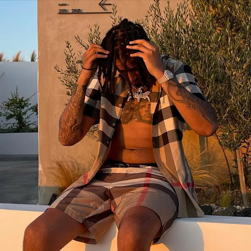 AJ Tracey outfit in Burberry and Nike, 2021