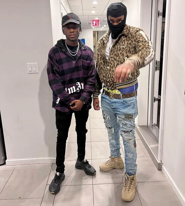 Fivio Foreign outfit in Amiri, Yeezy, and Louis Vuitton, 2021