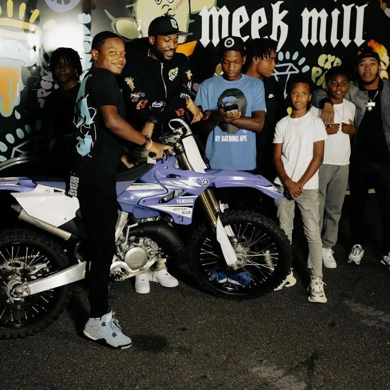 Meek Mill outfit in Who Decides War, Nike, and New Era, 2021