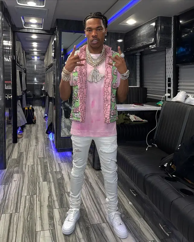 Lil Baby outfit in Comme Des Garcons, 1017 Alyx 9SM, and   Kaws, 2021
