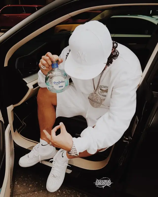 OhGeesy outfit in Cartier, New Era, and Nike, 2021