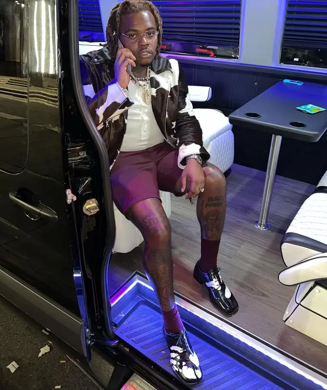 Gunna outfit in Maison Margiela, Hermes, and Cartier, 2021