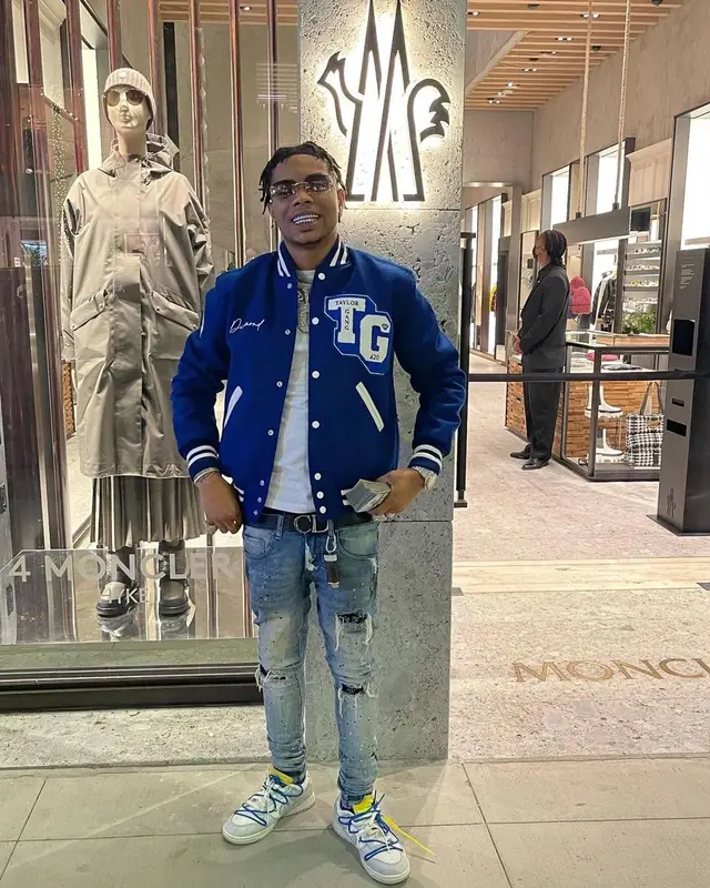 Lil Migo outfit in Diamond Supply Co., Taylor Gang, and Weedmaps, 2021