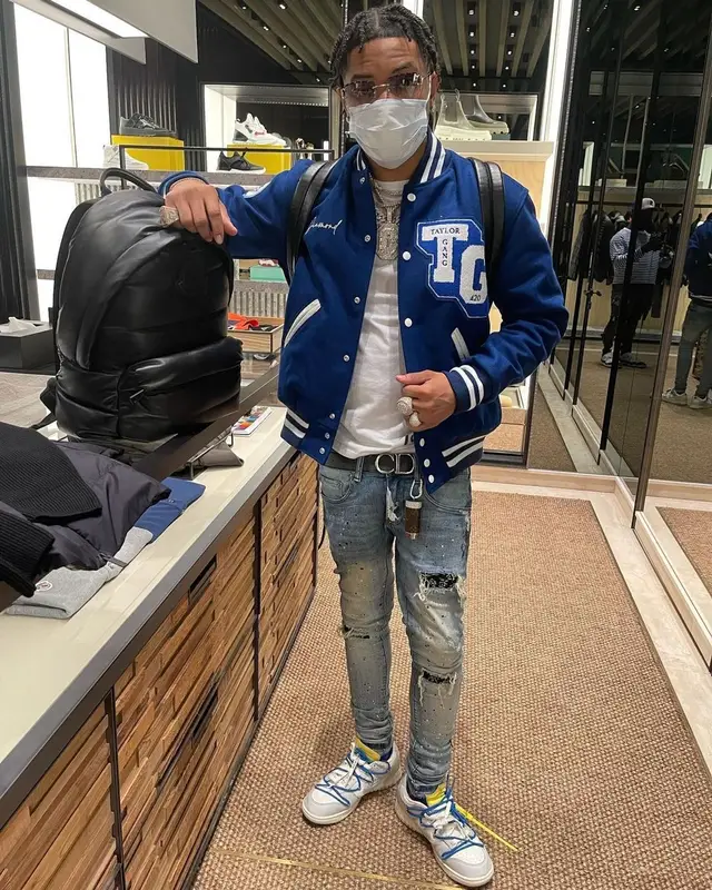 Lil Migo outfit in Diamond Supply Co., Taylor Gang, and Weedmaps, 2021