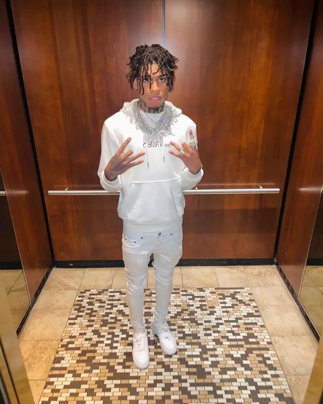 NLE Choppa outfit in Calvin Klein, Amiri, and Nike, 2021
