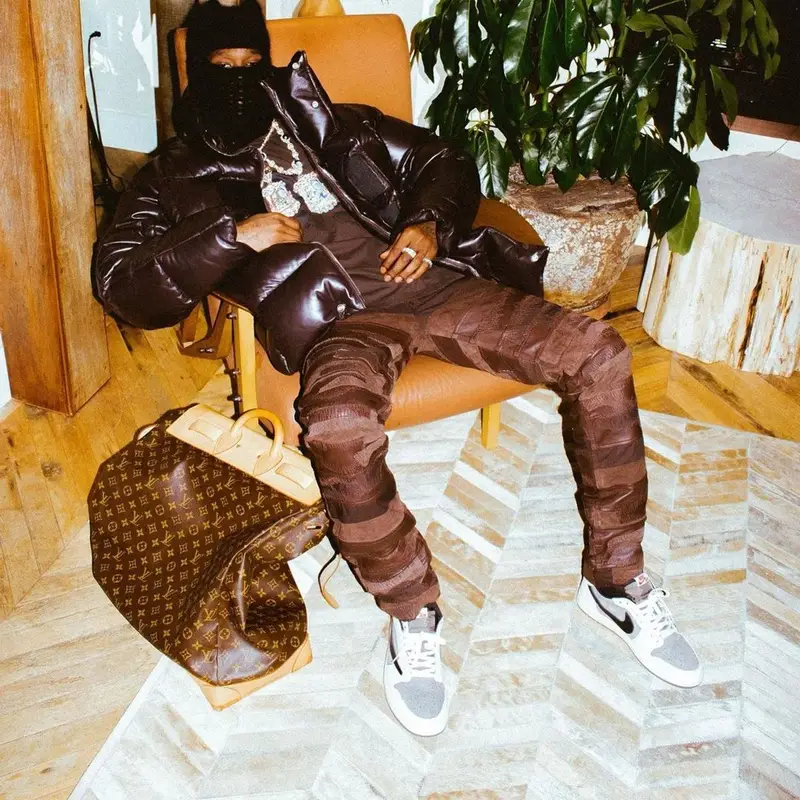 Travis Scott outfit in Number (N)ine, Louis Vuitton, and Givenchy, 2021