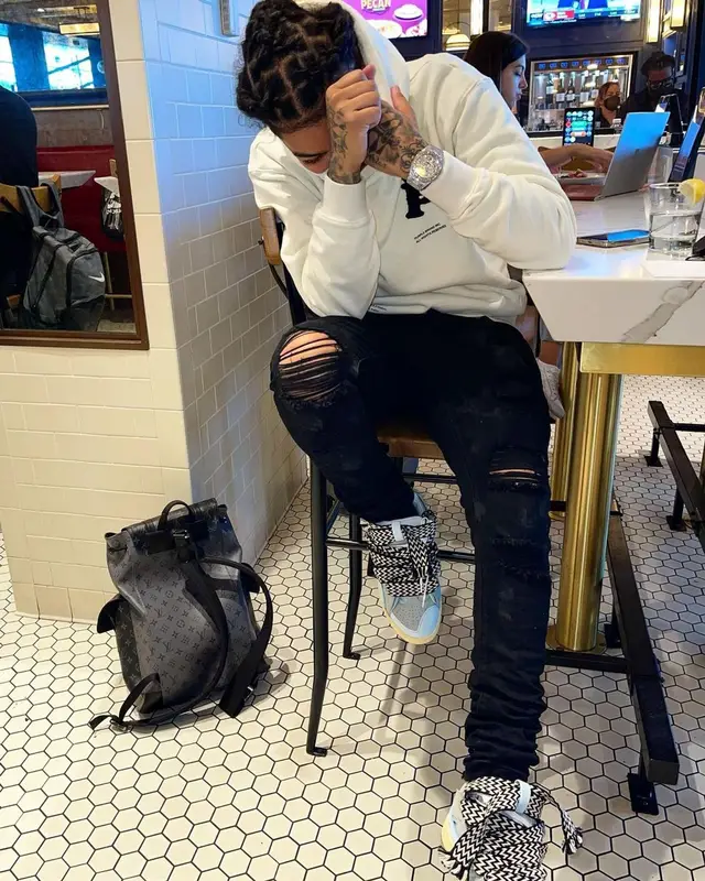 Young M.A outfit in Purple Brand, Lanvin, and Louis Vuitton, 2021