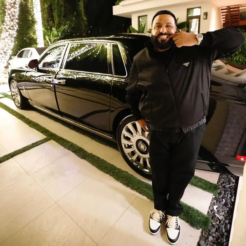 DJ Khaled outfit in Prada, Nike, and Travis Scott Merch, 2021