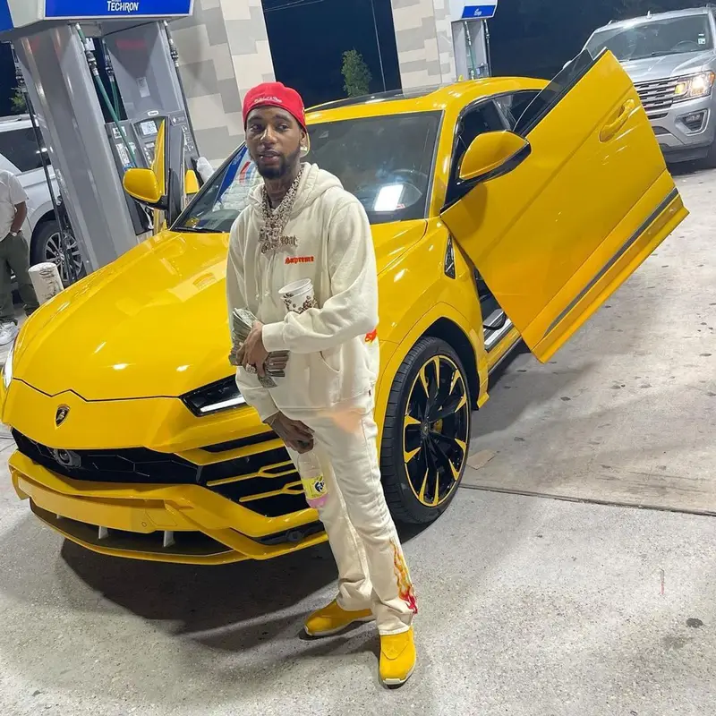 Key Glock outfit in Supreme, Gallery Dept., and Mitchell & Ness, 2021