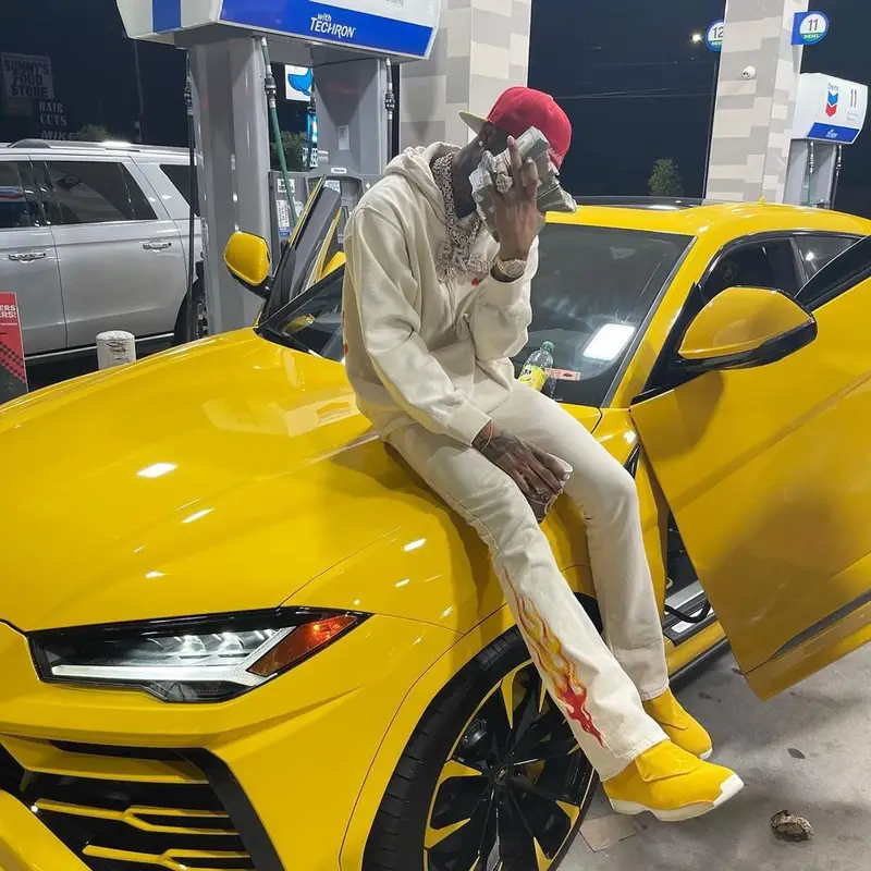 Key Glock outfit in Supreme, Gallery Dept., and Mitchell & Ness, 2021