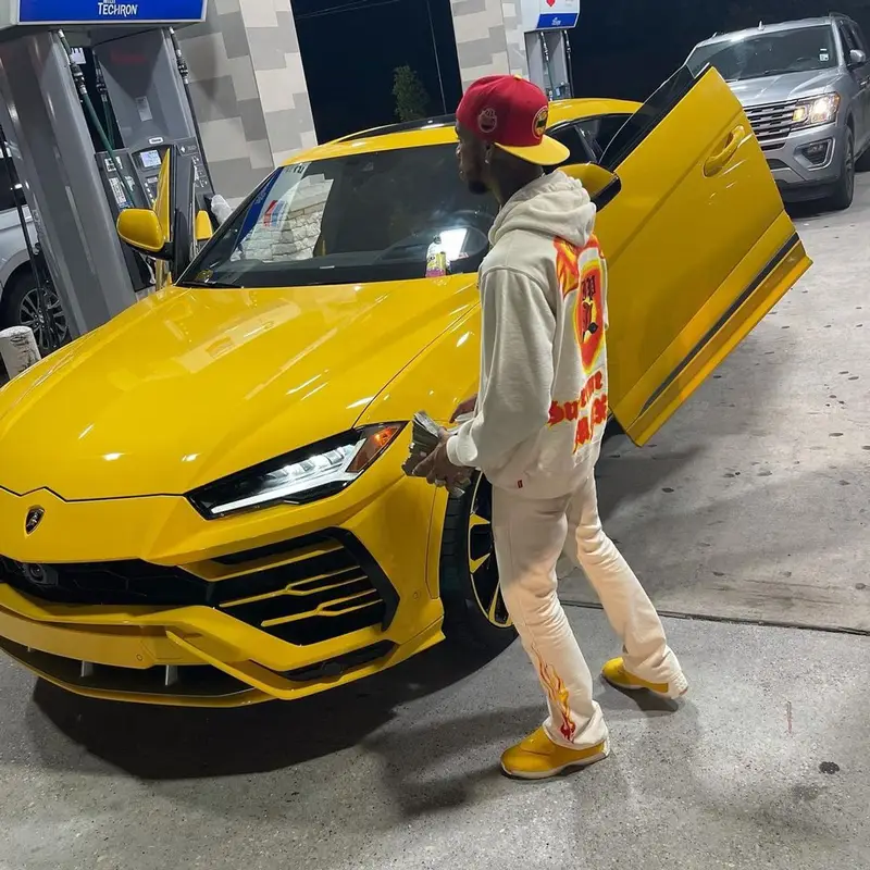 Key Glock outfit in Supreme, Gallery Dept., and Mitchell & Ness, 2021