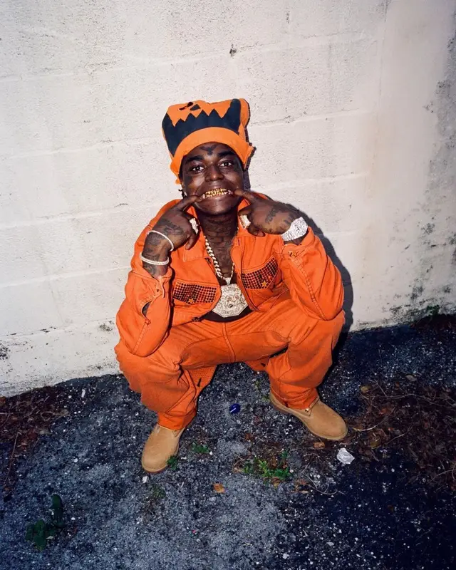 Kodak Black outfit in Robins Jeans, Timberland, and Asspizza , 2021
