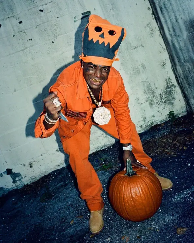 Kodak Black outfit in Robins Jeans, Timberland, and Asspizza , 2021