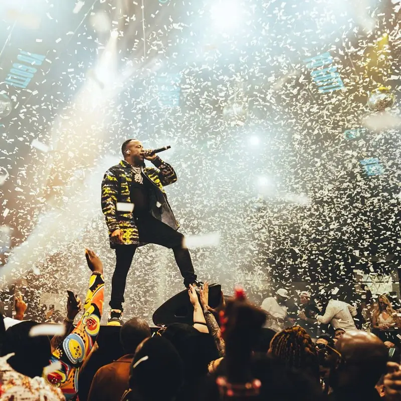 Yo Gotti outfit in Louis Vuitton, Amiri, and Jordan, 2021
