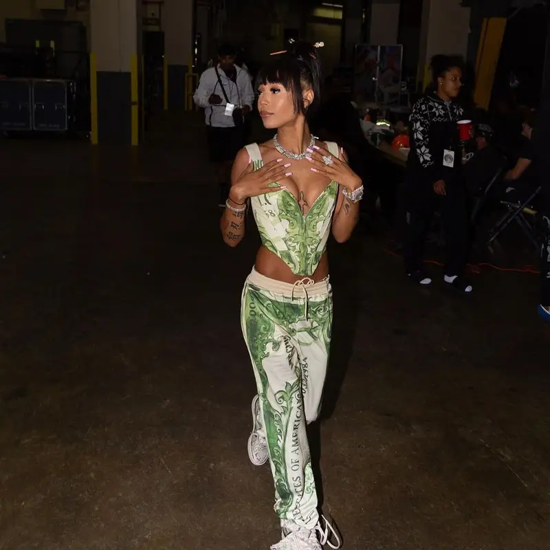 Coi Leray outfit in Moschino, Adidas, and Jeremy Scott, 2021