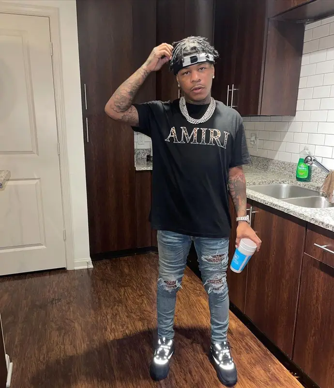 Rylo Rodriguez outfit in Amiri, Dior, and Rick Owens, 2021