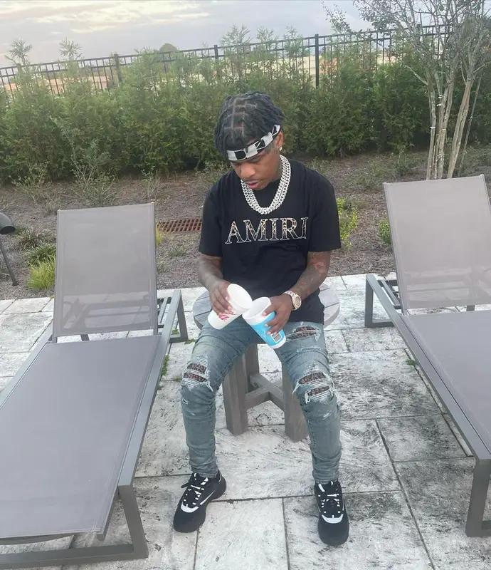 Rylo Rodriguez outfit in Amiri, Dior, and Rick Owens, 2021