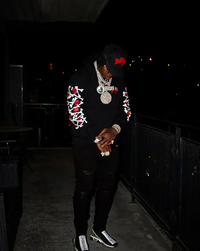 EST Gee outfit in Amiri, Dolce & Gabbana, and Cartier, 2021