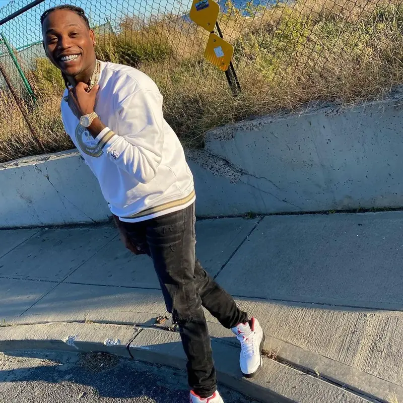 Flipp Dinero outfit in Kith, Amiri, and Jordan, 2021
