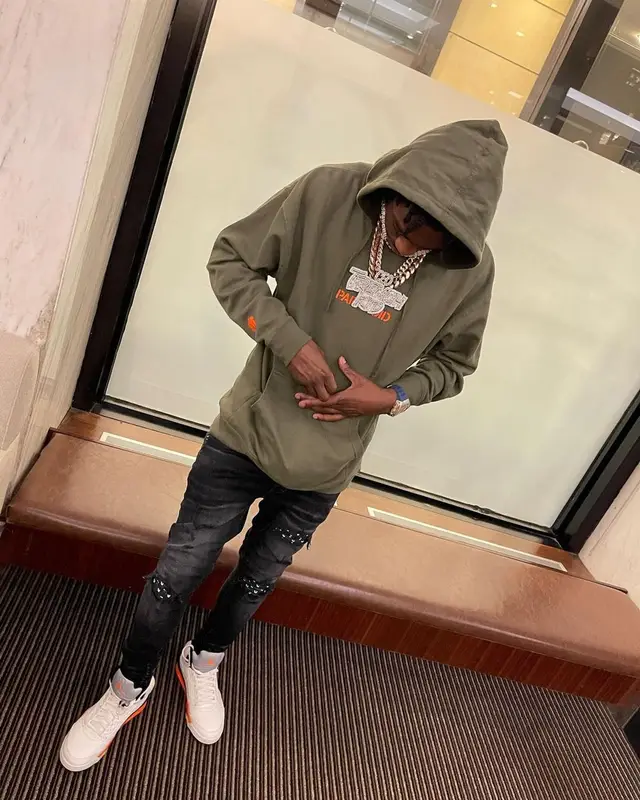 Lil Tjay outfit in Anti Social Social Club, Amiri, and Playboy, 2021