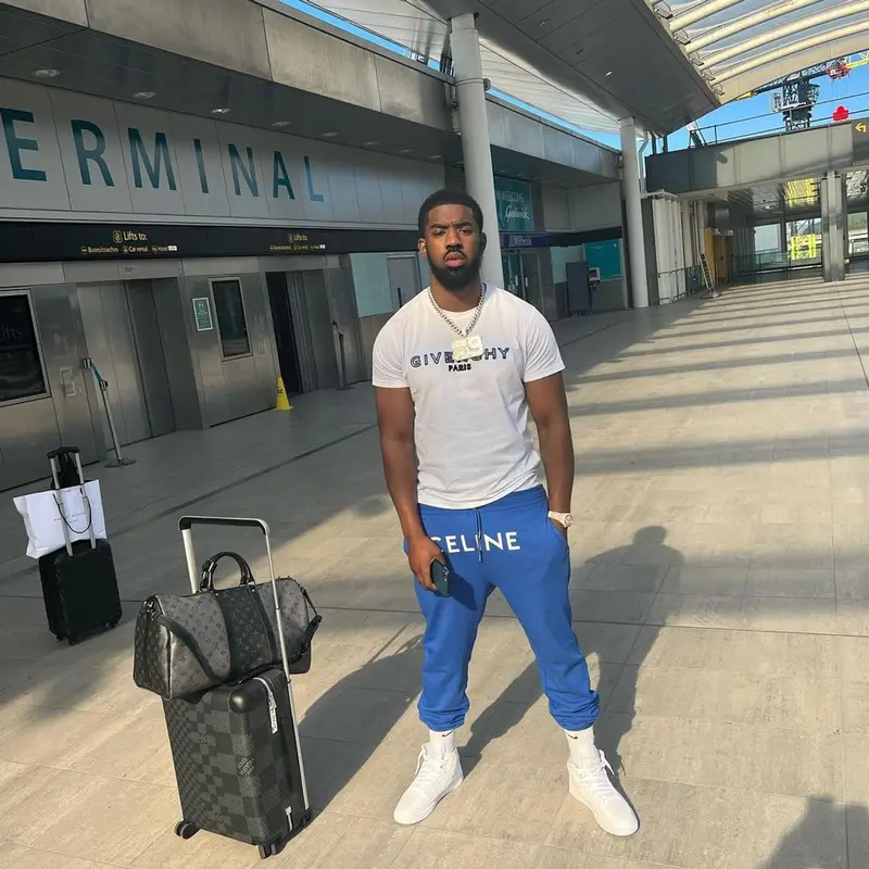 Tion Wayne outfit in Givenchy, Celine, and Nike, 2021