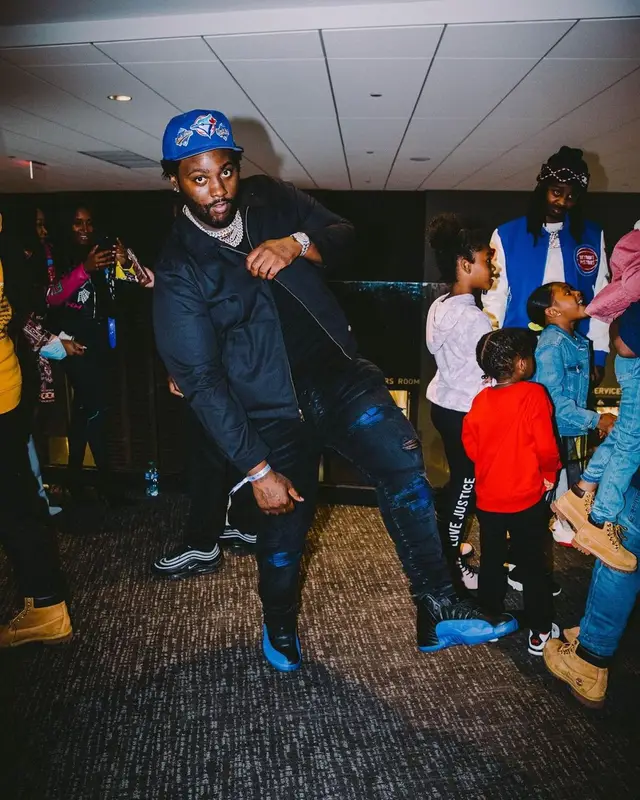 Peezy outfit in Dickies, Amiri, and New Era, 2021