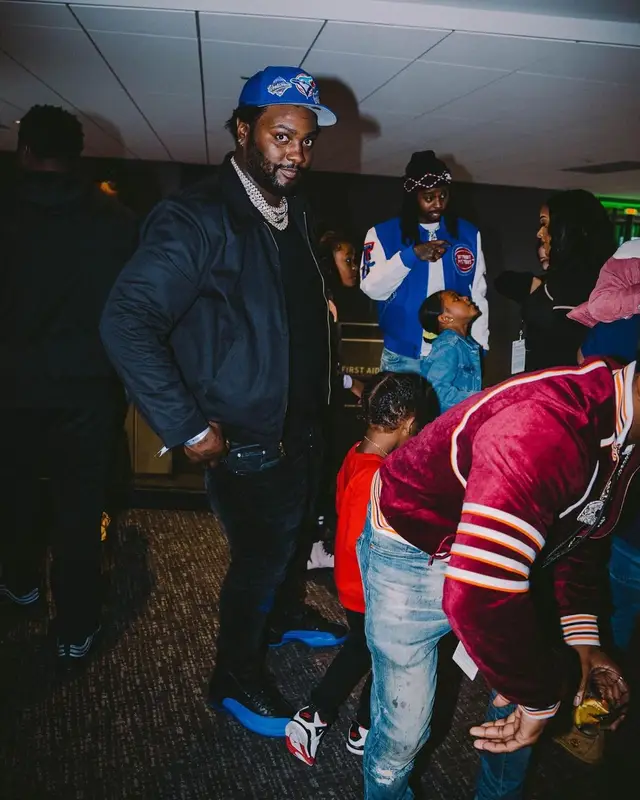 Peezy outfit in Dickies, Amiri, and New Era, 2021