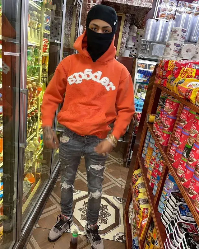 Kay Flock outfit in Spider Worldwide, Amiri, and Nike, 2021