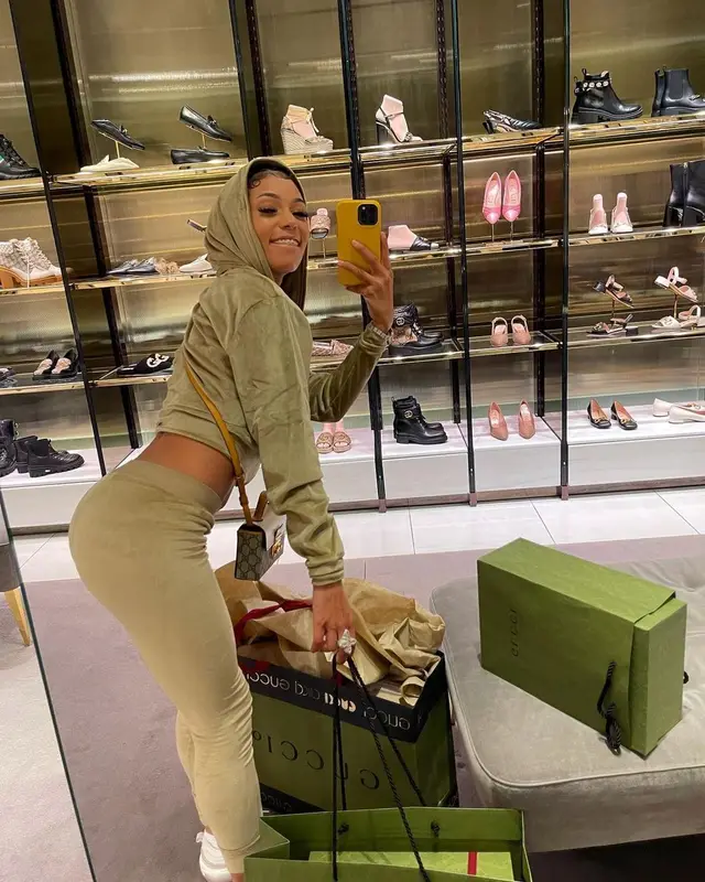 Coi Leray outfit in Skims, Nike, and Gucci, 2021