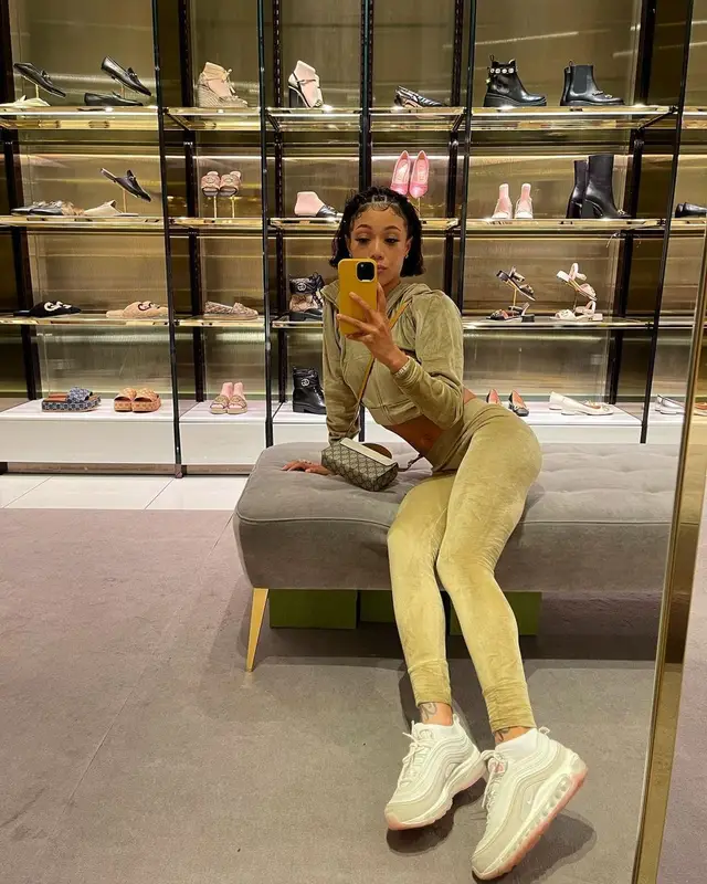 Coi Leray outfit in Skims, Nike, and Gucci, 2021