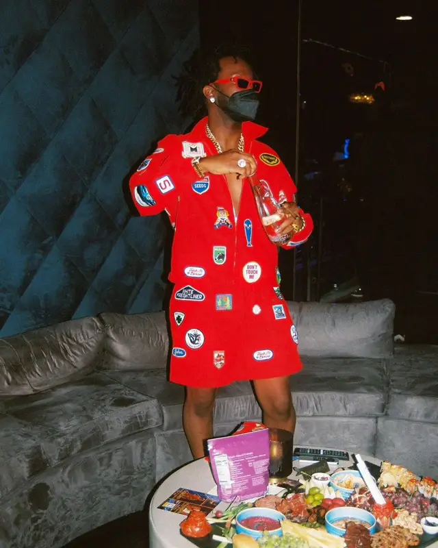 Juicy J outfit in Bode and Versace, 2021