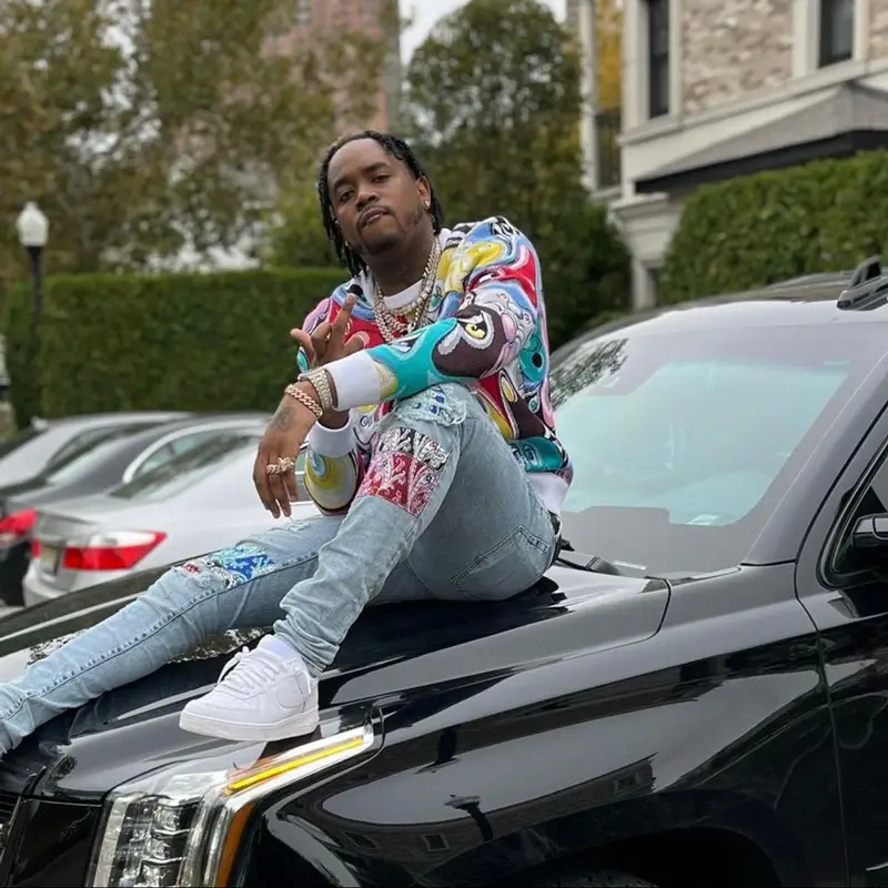 Fivio Foreign outfit in Dior, Amiri, and Nike, 2021